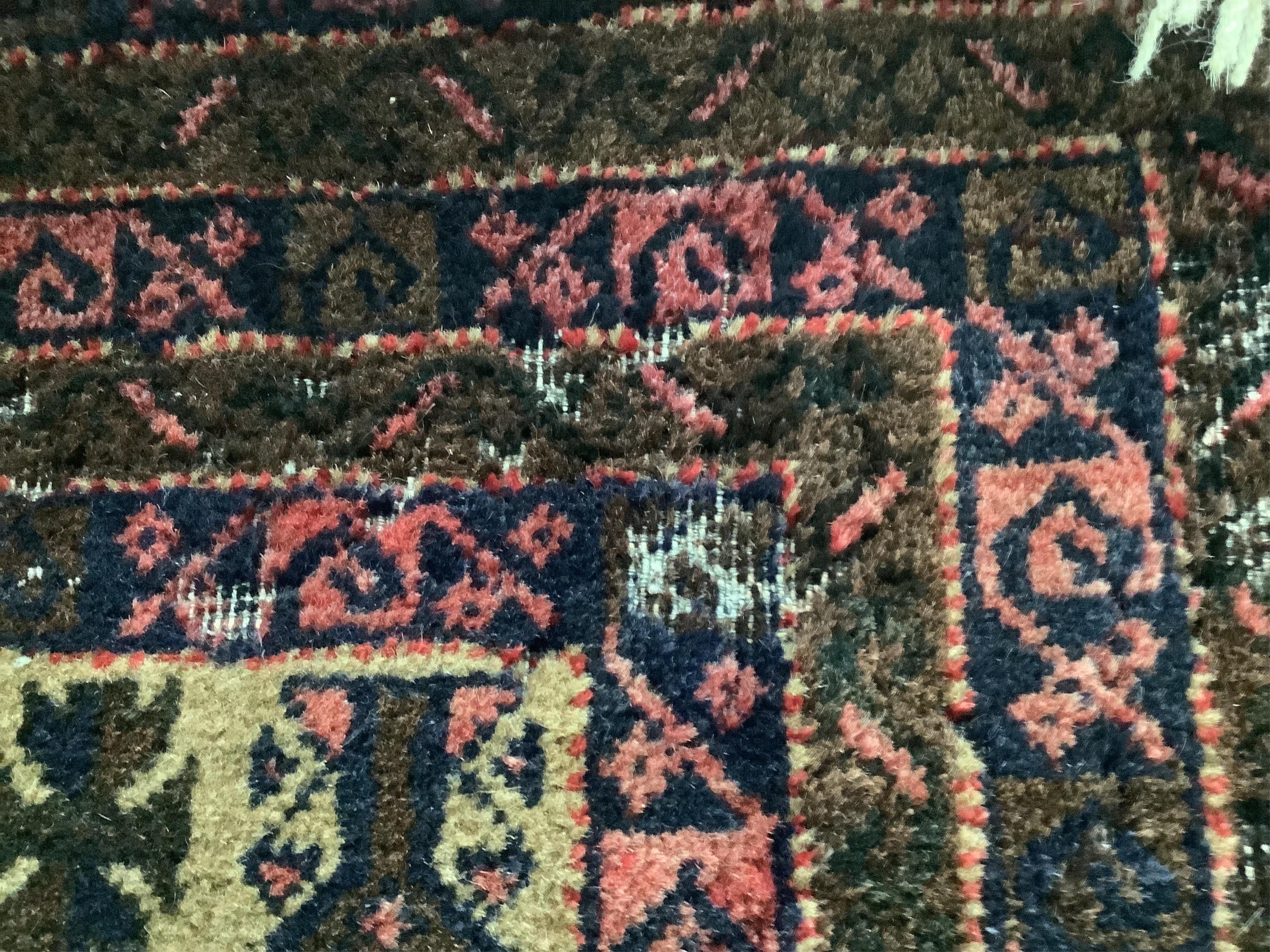 A Belouch fawn ground prayer rug, 152cm x 86cm. Condition - fair, areas of low pile